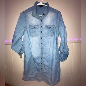Blue button-up shirt.